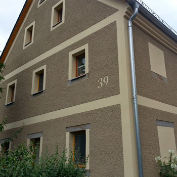 Arbeiten an Hausfassade